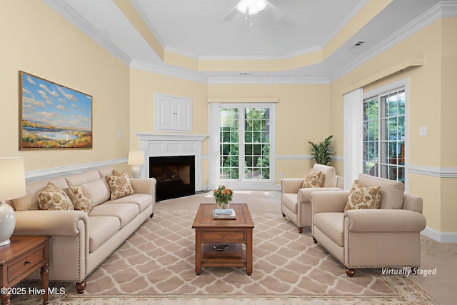 106 Oakmont Cir, New Bern, NC 28562 - living area with healthy amount of natural light, ceiling fan, a raised ceiling, crown molding, and a fireplace