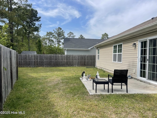 view of yard with a fenced backyard and a patio area