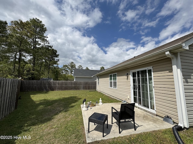 view of yard featuring a fenced backyard and a patio area