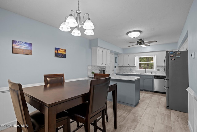 307 Little Rossie Rd, New Bern, NC 28560 - dining room featuring ceiling fan with notable chandelier