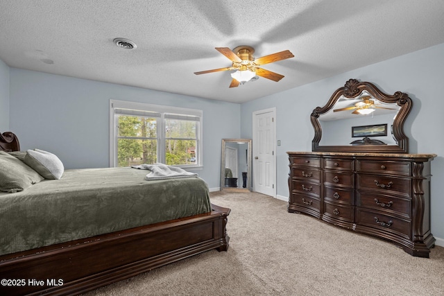 307 Little Rossie Rd, New Bern, NC 28560 - bedroom featuring a textured ceiling, visible vents, baseboards, and light carpet