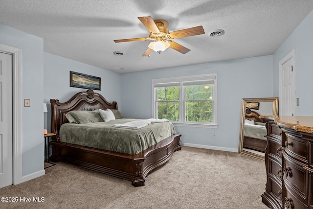307 Little Rossie Rd, New Bern, NC 28560 - bedroom with carpet, ceiling fan, baseboards, visible vents, and a textured ceiling
