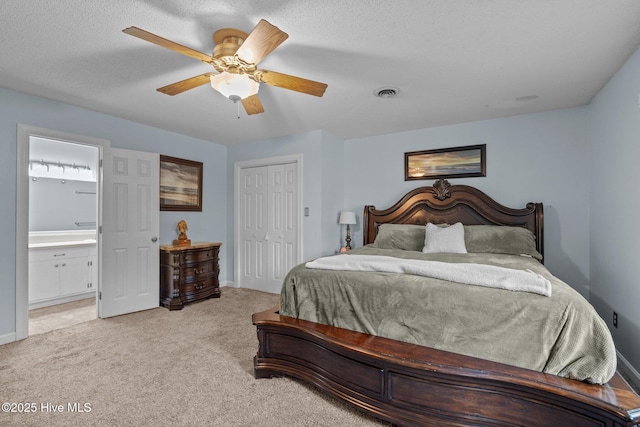 307 Little Rossie Rd, New Bern, NC 28560 - bedroom featuring ensuite bath, a closet, ceiling fan, light carpet, and visible vents