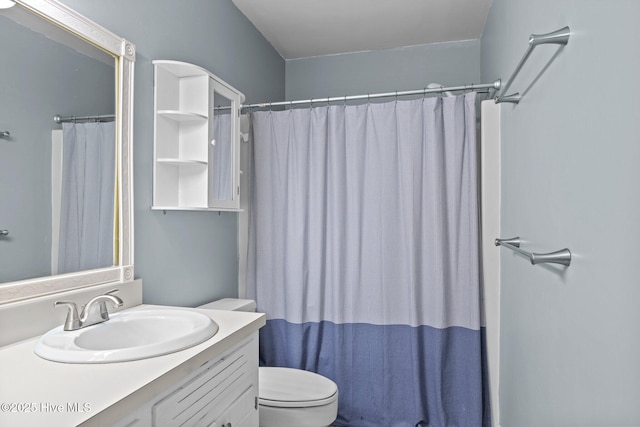 307 Little Rossie Rd, New Bern, NC 28560 - bathroom featuring toilet, vanity, and a shower with shower curtain
