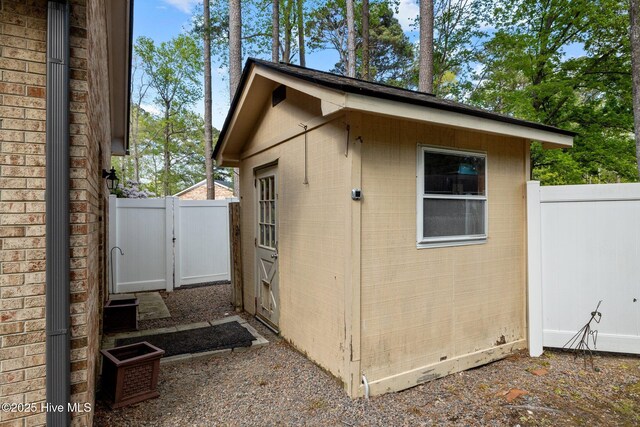 307 Little Rossie Rd, New Bern, NC 28560 - view of outbuilding with fence, a gate, and an outbuilding