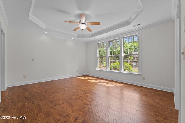 80 Whistling Straight Rd, Pinehurst, NC 28374 - unfurnished room featuring a raised ceiling, ceiling fan, hardwood / wood-style flooring, and ornamental molding