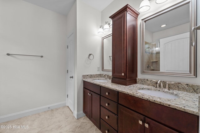 80 Whistling Straight Rd, Pinehurst, NC 28374 - bathroom with double vanity, tiled shower, and tile patterned floors