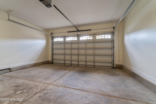 80 Whistling Straight Rd, Pinehurst, NC 28374 - garage with baseboards and a garage door opener