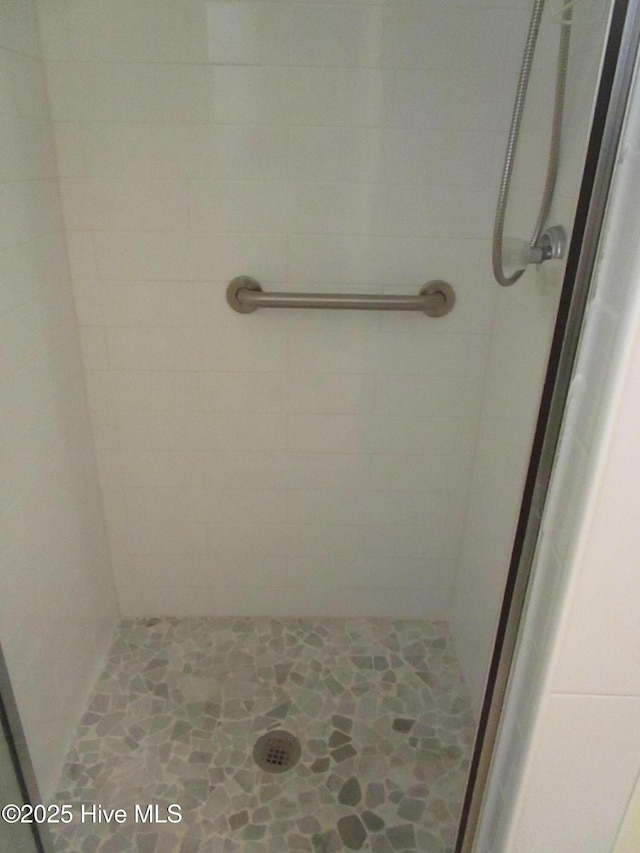 bathroom featuring a stall shower