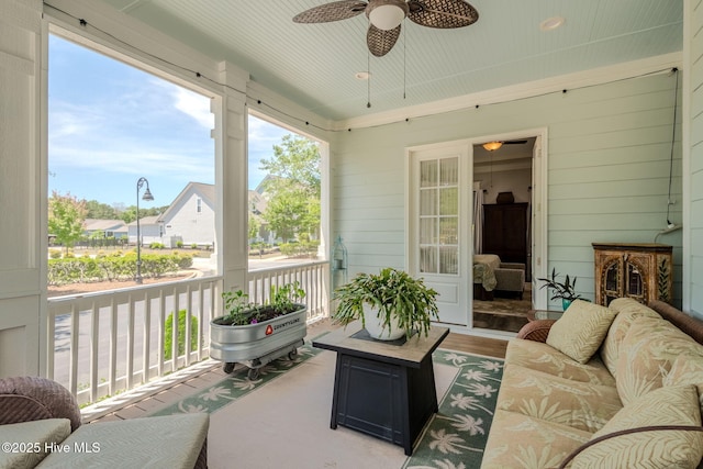 9298 W Lake Rd, Calabash, NC 28467 - sunroom with ceiling fan and outdoor lounge area