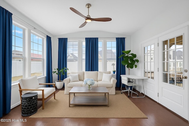 sunroom / solarium featuring french doors