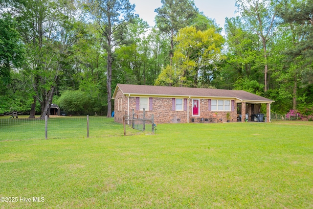 ranch-style home with crawl space, a front yard, fence, and brick siding