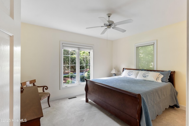 8819 Sawmill Creek Ln, Wilmington, NC 28411 - bedroom featuring light colored carpet, baseboards, and ceiling fan