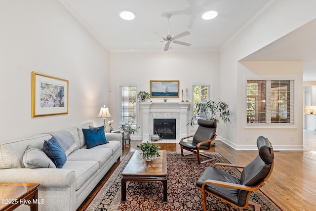 8819 Sawmill Creek Ln, Wilmington, NC 28411 - living room with wood finished floors, ornamental molding, a ceiling fan, recessed lighting, and baseboards