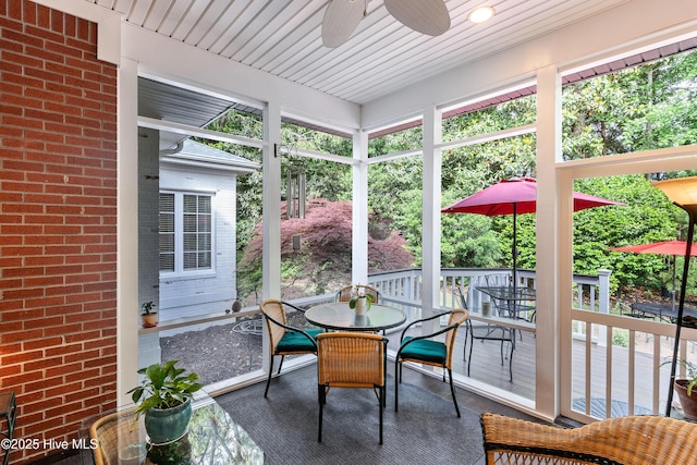 8819 Sawmill Creek Ln, Wilmington, NC 28411 - sunroom with outdoor dining space and ceiling fan