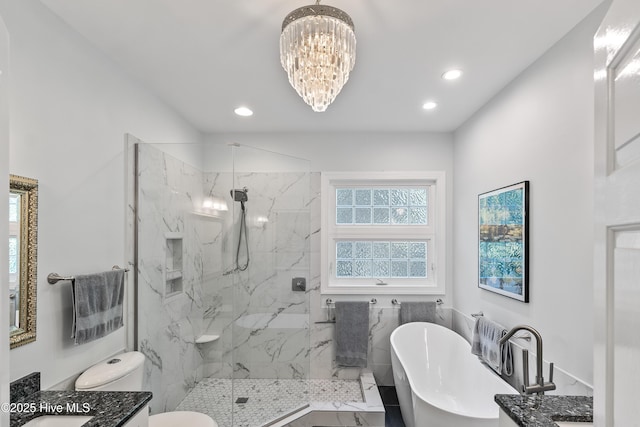 8819 Sawmill Creek Ln, Wilmington, NC 28411 - bathroom with a chandelier, vanity, a marble finish shower, a soaking tub, and recessed lighting