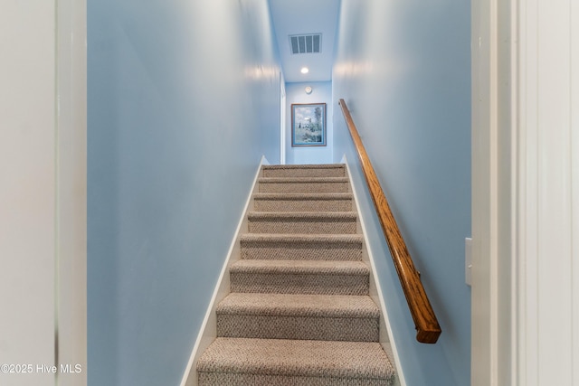 8819 Sawmill Creek Ln, Wilmington, NC 28411 - staircase featuring baseboards