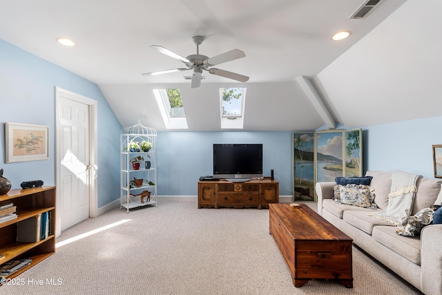 8819 Sawmill Creek Ln, Wilmington, NC 28411 - carpeted living area with lofted ceiling, a ceiling fan, a skylight, baseboards, and recessed lighting