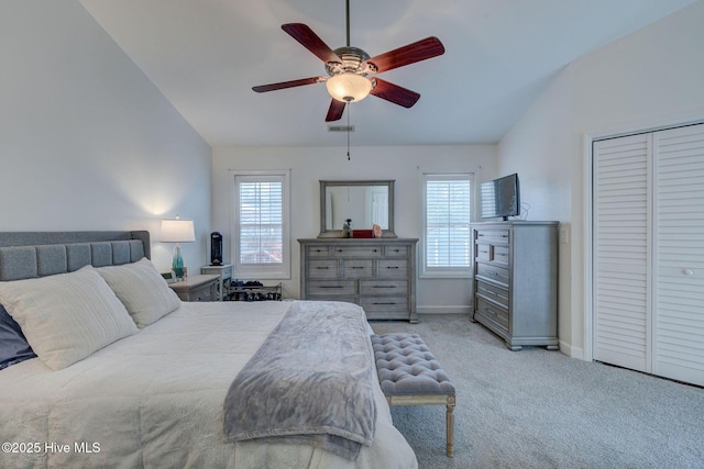 5029 Woods Edge Rd, Wilmington, NC 28409 - carpeted bedroom featuring visible vents, baseboards, vaulted ceiling, and multiple windows