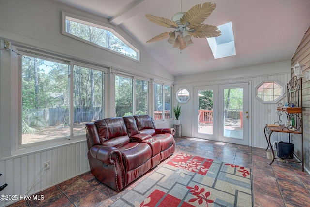 5029 Woods Edge Rd, Wilmington, NC 28409 - sunroom featuring stone tile flooring, vaulted ceiling with skylight, french doors, and plenty of natural light