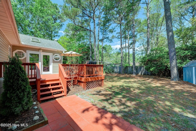 5029 Woods Edge Rd, Wilmington, NC 28409 - view of yard with a deck and a fenced backyard