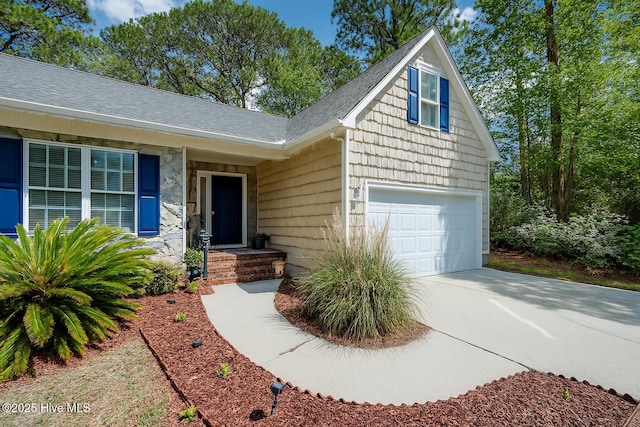 5029 Woods Edge Rd, Wilmington, NC 28409 - view of front of property featuring a shingled roof, driveway, and an attached garage