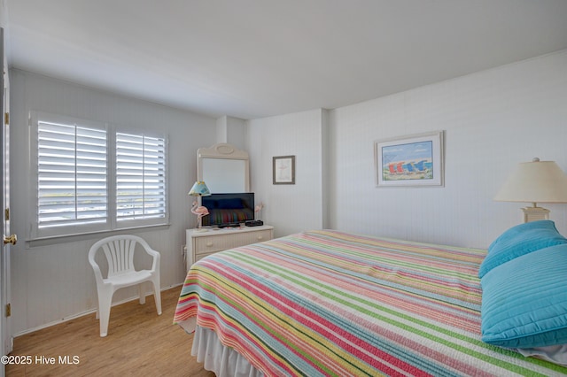 bedroom with light wood-type flooring