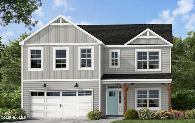 view of front of house featuring a shingled roof, a garage, and concrete driveway