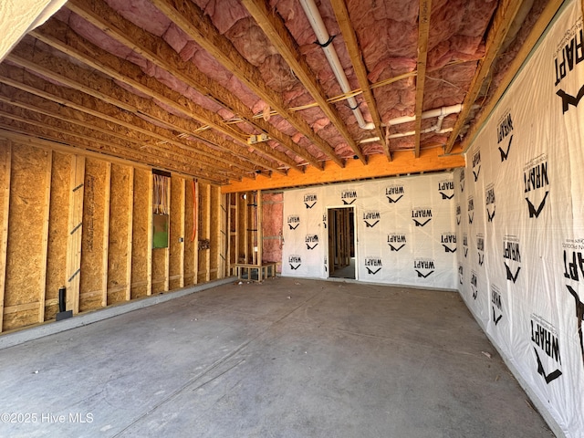 500 Grassy Gap Trl Unit 71, Aberdeen, NC 28315 - miscellaneous room with unfinished concrete floors and a garage
