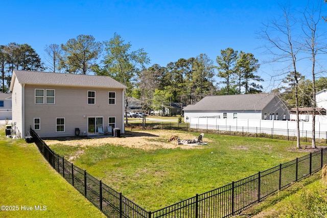 4333 Jones St SW, Shallotte, NC 28470 - view of yard with an outdoor fire pit and fence private yard