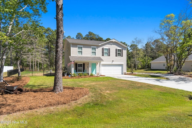 4333 Jones St SW, Shallotte, NC 28470 - traditional-style house featuring fence, a shingled roof, a front lawn, an attached garage, and driveway