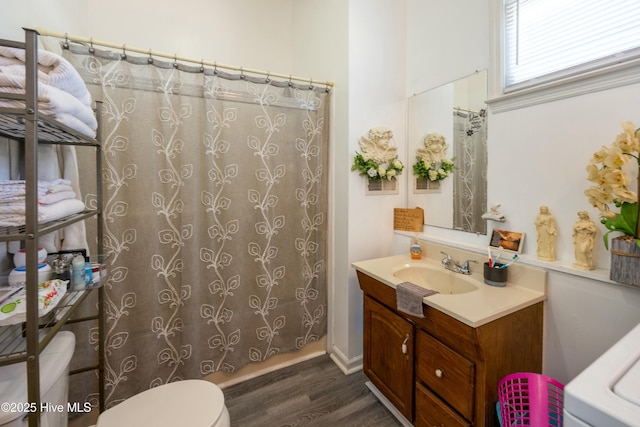 479 W 5th St, Garland, NC 28441 - full bath with toilet, wood finished floors, vanity, and a shower with curtain