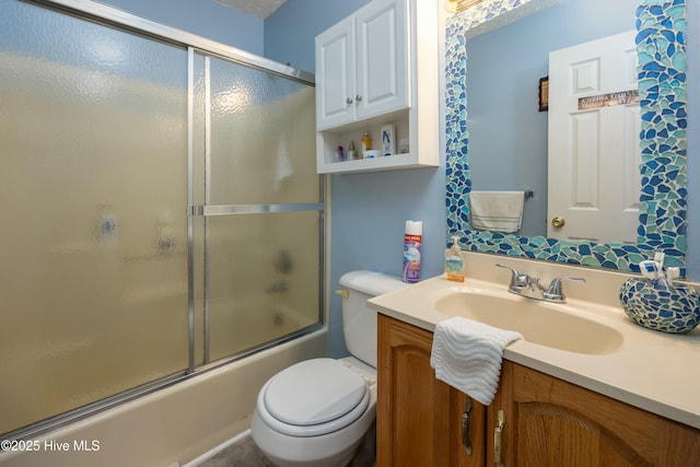 479 W 5th St, Garland, NC 28441 - bathroom featuring toilet, vanity, and enclosed tub / shower combo