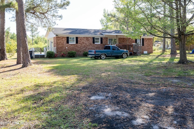 479 W 5th St, Garland, NC 28441 - view of yard featuring a wooden deck