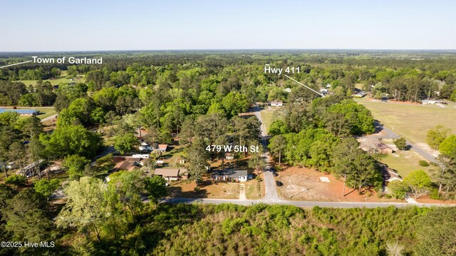 479 W 5th St, Garland, NC 28441 - birds eye view of property featuring a view of trees