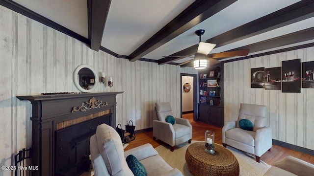 724 York St, Rocky Mount, NC 27803 - living area featuring wood finished floors, a fireplace, beamed ceiling, baseboards, and ceiling fan