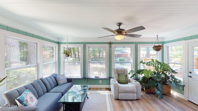 724 York St, Rocky Mount, NC 27803 - sunroom featuring crown molding, wood finished floors, and a wealth of natural light