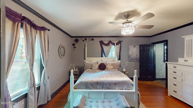 724 York St, Rocky Mount, NC 27803 - bedroom with baseboards, a ceiling fan, crown molding, and wood finished floors