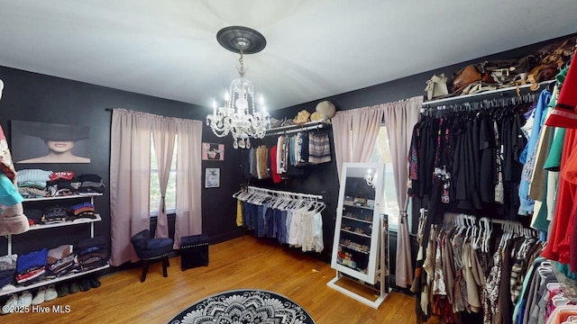 724 York St, Rocky Mount, NC 27803 - walk in closet with an inviting chandelier and wood finished floors