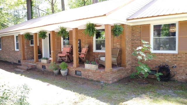 724 York St, Rocky Mount, NC 27803 - ranch-style house with covered porch, crawl space, metal roof, and brick siding