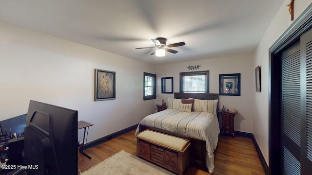 724 York St, Rocky Mount, NC 27803 - bedroom with a ceiling fan, baseboards, wood finished floors, and a closet
