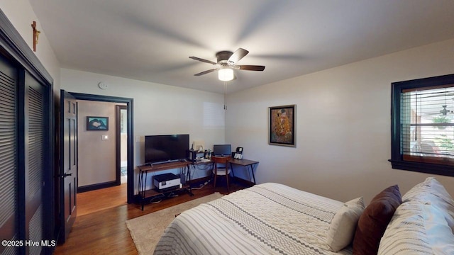 724 York St, Rocky Mount, NC 27803 - bedroom featuring baseboards, ceiling fan, wood finished floors, and a closet