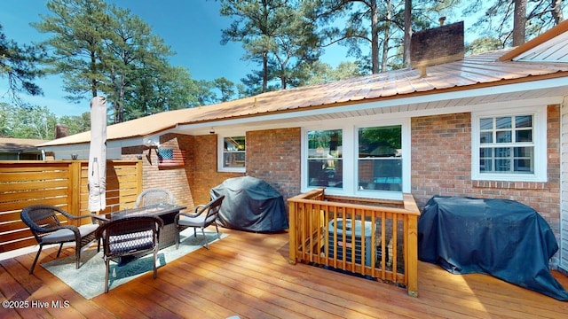724 York St, Rocky Mount, NC 27803 - wooden deck with a grill