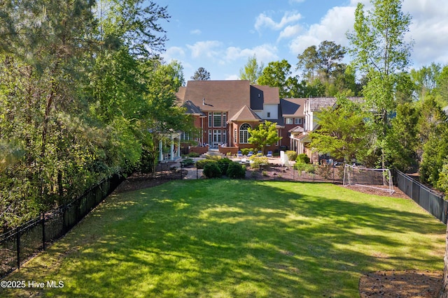 view of yard with a pergola and a fenced backyard