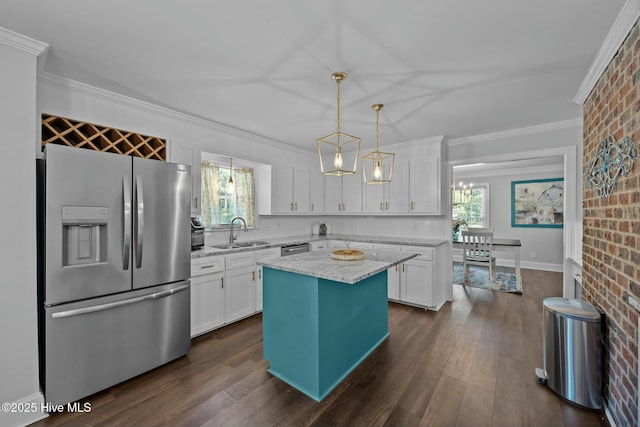 kitchen featuring a sink, white cabinets, appliances with stainless steel finishes, and dark wood-style flooring