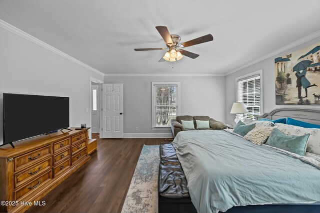 bedroom with crown molding, baseboards, multiple windows, and dark wood finished floors