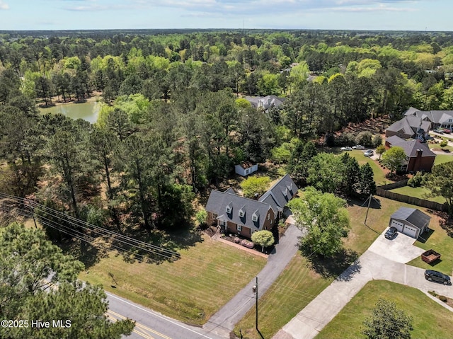bird's eye view featuring a view of trees