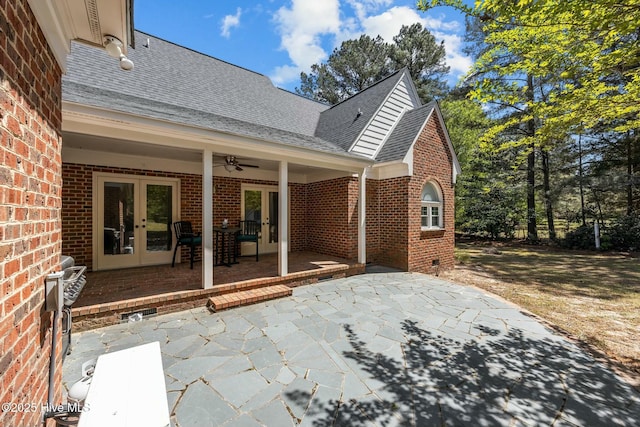 view of patio featuring french doors and ceiling fan