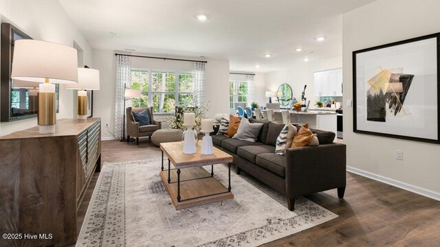 3048 Platinum Cir W, End, NC 27376 - living room with wood finished floors, baseboards, and recessed lighting
