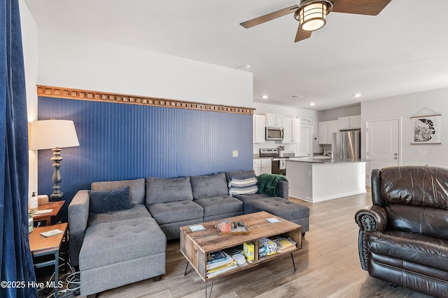 1524 Pleasant Hollow Ct SE, Bolivia, NC 28422 - living room with light wood-style floors, a ceiling fan, and recessed lighting